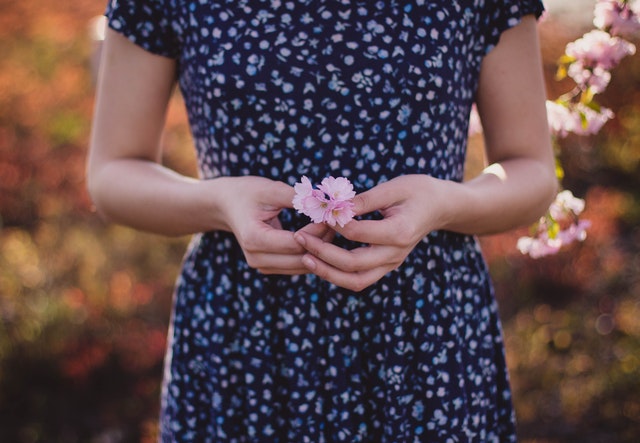 Holding a flower